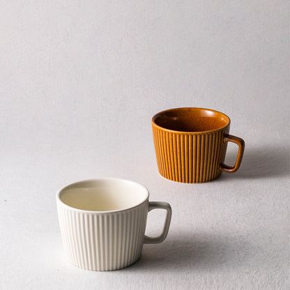 2 Vintage Style Ribbed Mugs in Vanilla Steamer (bottom left) &  Caramel Mocha colors (top right).