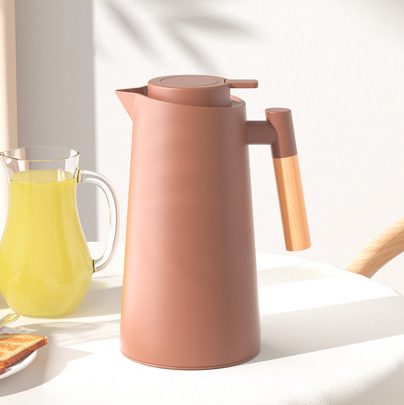 Sleek, Modern Electric Kettle with Beechwood Handle - Contemporary Kitchen Essential