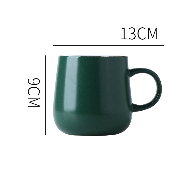 Dark Green "Keep 'Er Warm" Mug with product dimensions typed out.