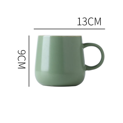 Light Green "Keep 'Er Warm" Mug with product dimensions typed out.