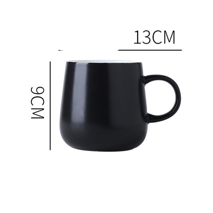 Black "Keep 'Er Warm" Mug with product dimensions typed out.