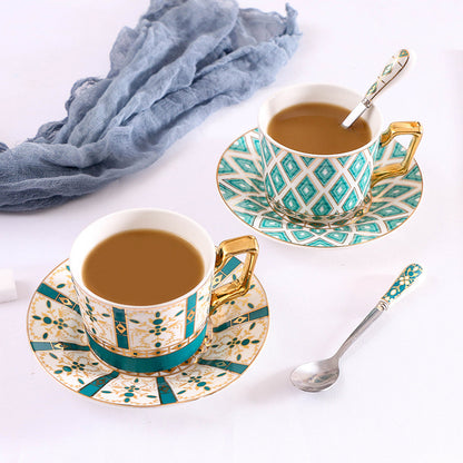 2 Turkish Coffee Cup & Saucer Sets (Dark Teal & Gold and one Floral Teal & Gold Rhombus) with one spoon