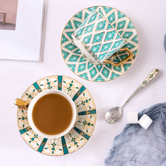 2 Turkish Coffee Cup & Saucer Sets (Dark Teal & Gold and one Floral Teal & Gold Rhombus) with one spoon