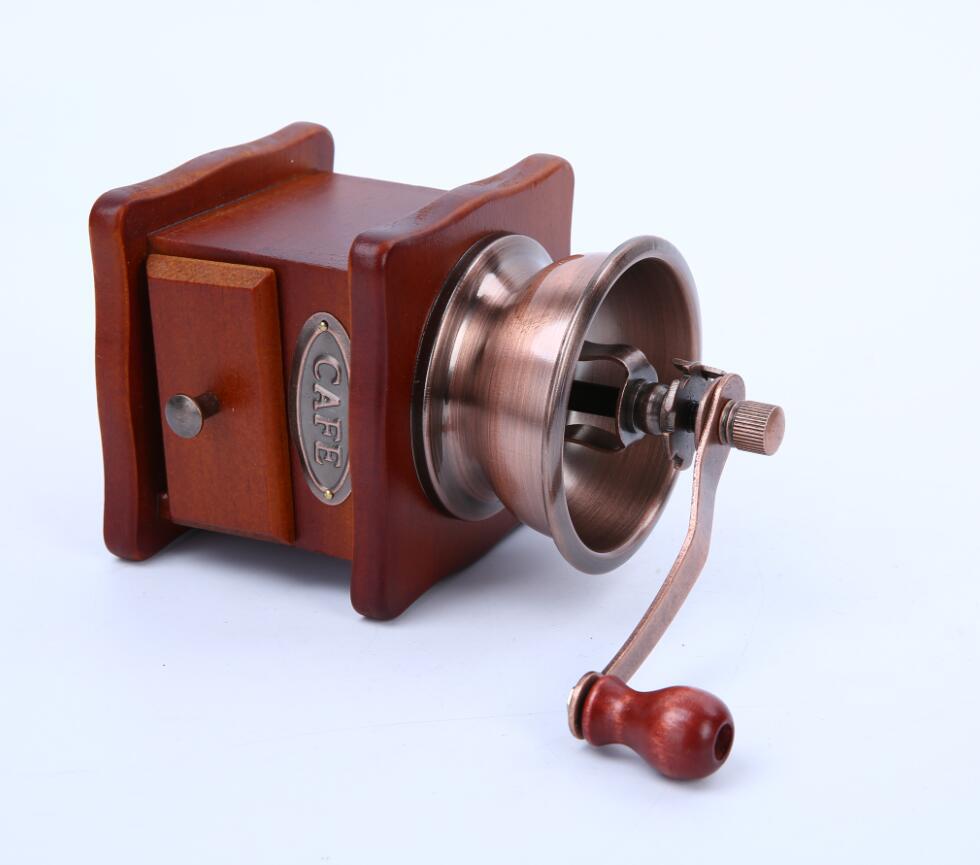 Vintage Style Wooden Manual Coffee Grinder lying on its side