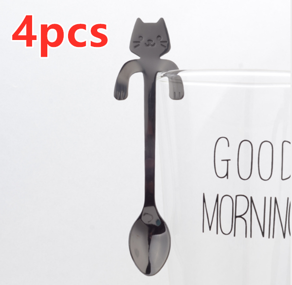 Hanging Cat Spoon in Black on glass cup that says good morning