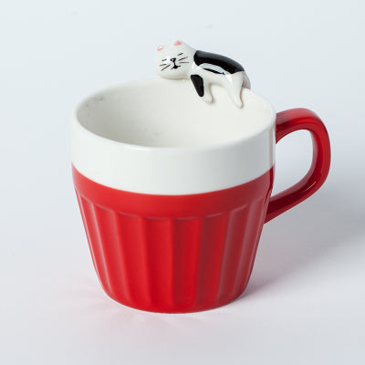 Cat On The Rim Mug in pink. Thin-ribbed mug.