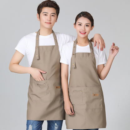 High-Quality Cotton Barista ApronsA man and a woman, each wearing a beige brown apron.