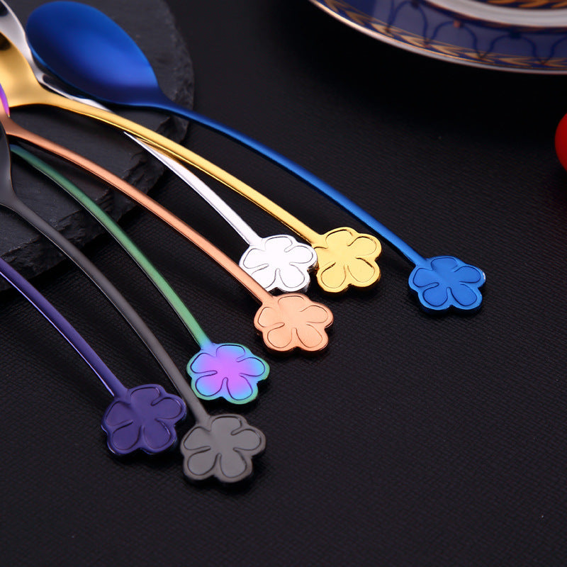 7 Flower-Shaped Handle Dessert & Coffee Spoons in black, purple, gold, silver, rose gold, rainbow, and blue