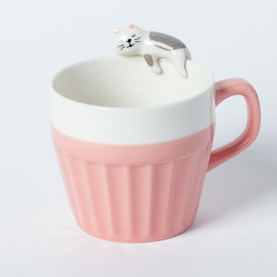 Cat On The Rim Mug in pink.