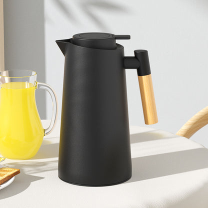 Sleek, Modern Electric Kettle with Beechwood Handle - Contemporary Kitchen Essential