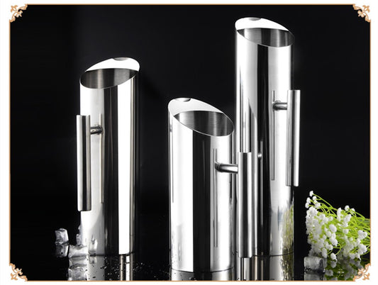 3 Classic stainless steel water pitchers, in small, medium, and large.