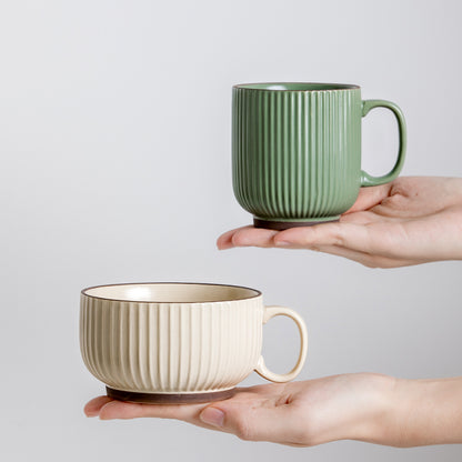 Ribbed Scandinavian Style Coffee Mugs. One in Earth Green and one in creamy beige color.