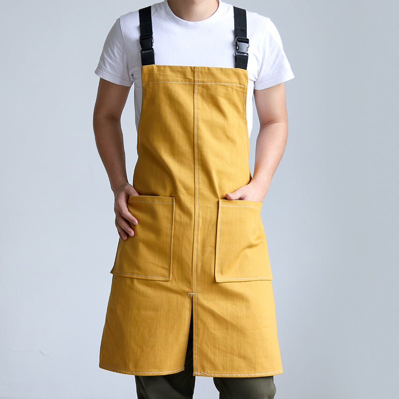 Person wearing Cut-Away Style Denim Apron Mustard Yellow