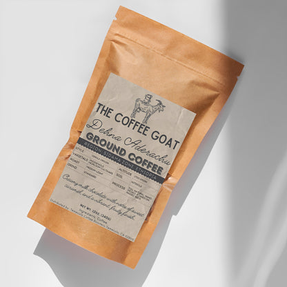 A 12oz brown kraft paper coffee bag of Dehna Aderachu, a single origin whole bean coffee from Ethiopia by The Coffee Goat