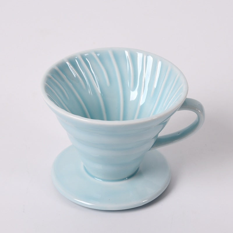 Pastel blue Ceramic Pour Over Coffee Filter on a white background.