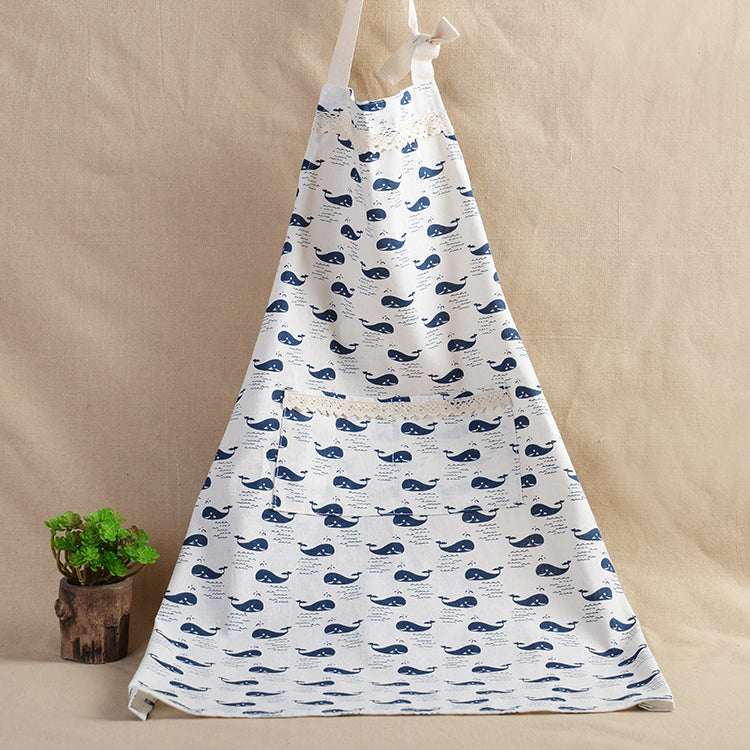 White apron with blue whale pattern