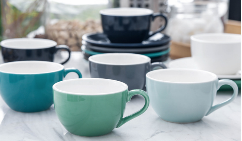 Multiple Classic Cafe-Style Espresso Coffee Cup and Saucer Sets, pictured together.